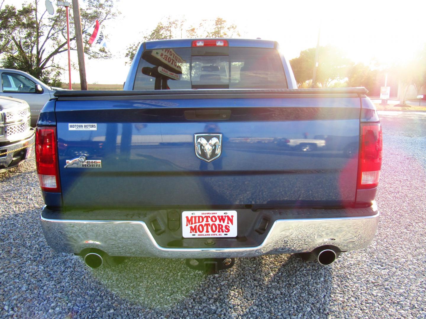 2011 Blue Dodge Ram 1500 SLT Quad Cab 2WD (1D7RB1GT3BS) with an 5.7L V8 OHV 16V engine, Automatic transmission, located at 15016 S Hwy 231, Midland City, AL, 36350, (334) 983-3001, 31.306210, -85.495277 - Photo#6